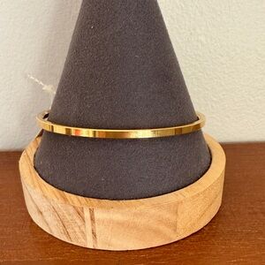 Vintage TRIFARI signed high shine finish gold bangle 7.5